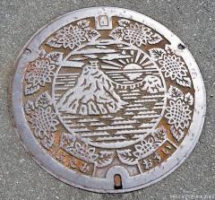 About Japan from... manhole covers, Sunrise at Meoto Iwa