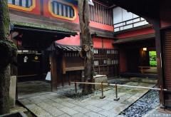 Sumiya entrance and the red walls of the former Kyoto geisha district