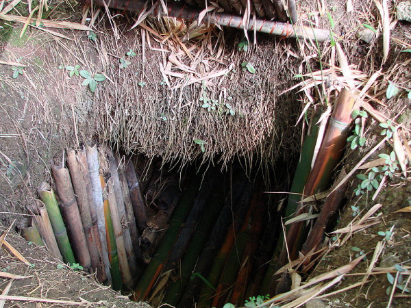 The entrance to the reproduction of Japanese hideout Shoichi Yokoi's cave on Guam