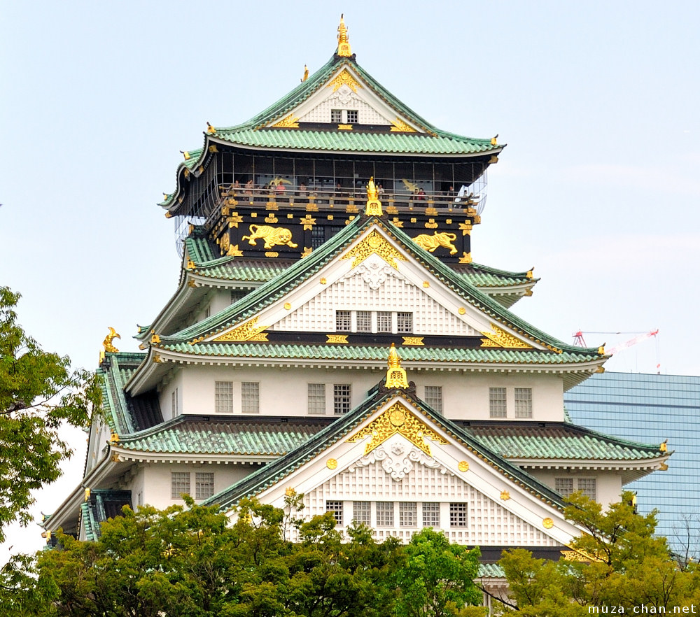 Osaka Castle glamorous gold decorations and a travel tipTraditional Japanese fire lookout tower